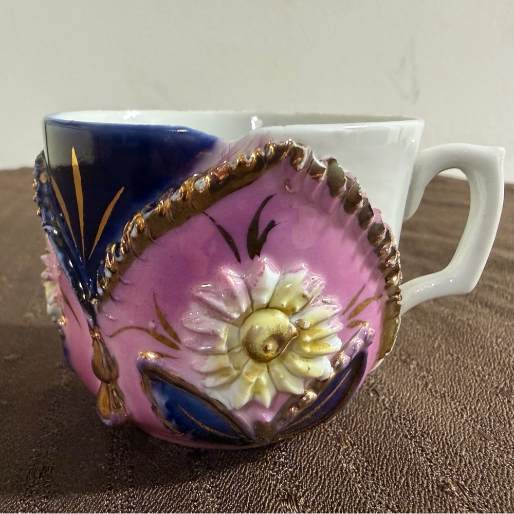 Vintage German Lusterware Porcelain Cup Featuring a Floral Design